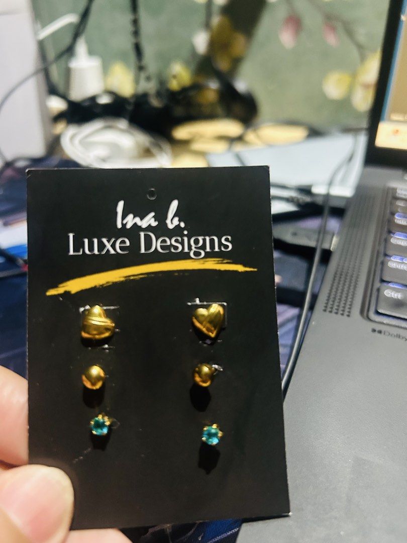 Luxe Designs Gold Heart and Stud Earrings Set (Category: Earrings) located in Paranaque City. Submitted by annegut (Listing ID 1449492199, Image 3). Description: - Set of 4 pairs of earrings/ for take all - Includes: Gold hearts, gold balls, and blue stud earrings. - Versatile: Great for mixing and matching. - Suitable for everyday wear or special occasions. - hypoallergenic/plated/ stainless steel .