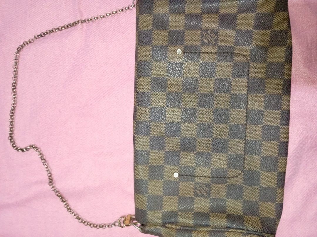 LV Damier (Category: Luxury Bags & Wallets) located in Malolos. Submitted by shoptokyothrift (Listing ID 1449428448, Image 3). Description: Louis Vuitton Damier Vintage pre-loved piece. Sold AS IS with normal signs of use and storage. Please check all photos carefully and buy based on your own assessment. What you see is what you get. No returns or refunds. ✨.