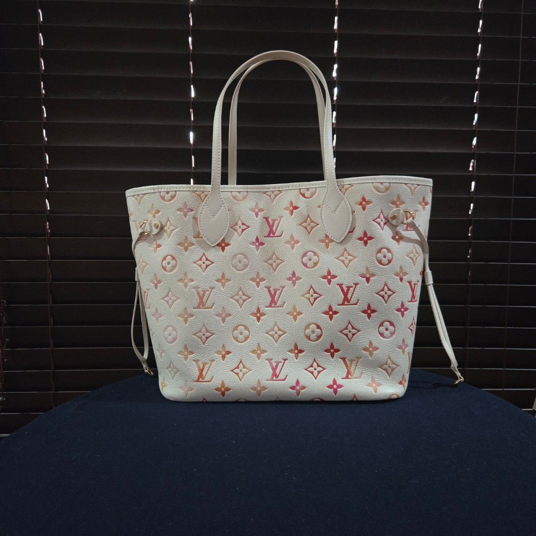 Lv Neverfull (Category: Luxury Bags & Wallets) located in Paranaque City. Submitted by dclutterqueen (Listing ID 1449336559, Image 2). Description: LV Neverfull Sunrise Aquarelle (Limited edition) Monogram Empreinte 💯 Genuine Leather 🇯🇵 Acquired preloved from Japan 👜 MM size measures approximately 47x 28x 14 cm.