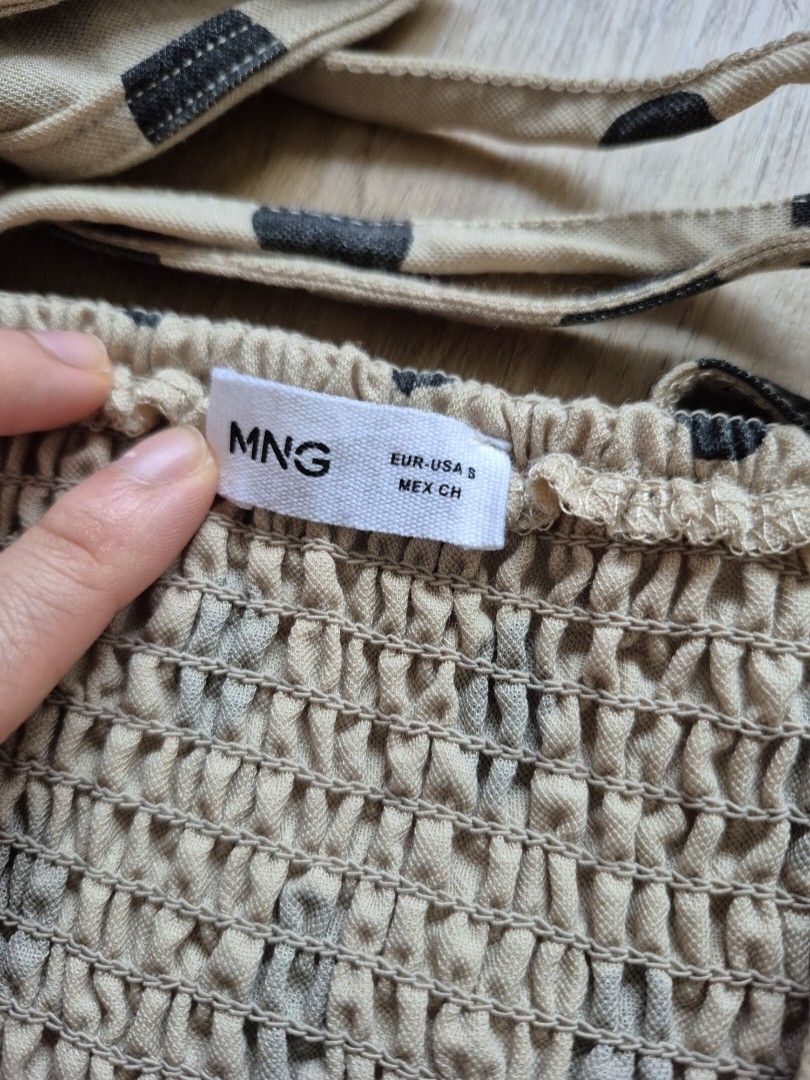 Mango Polka Dot Cropped Puff-sleeve top (Category: Blouses) located in Mandaluyong City. Submitted by _spike (Listing ID 1449414576, Image 2). Description: Cropped Polka Dot Puff-Sleeve top from mango. Comes with a smocked tie-up back. Worn only once..
