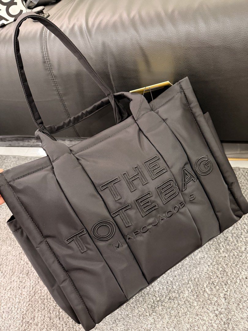 Marc Jacobs The Puffy Nylon Tote Bag Large (Category: Luxury Bags & Wallets) located in Manila. Submitted by luxora.ph (Listing ID 1449420198, Image 1). Description: Guaranteed authentic! Also available in medium and cement color.