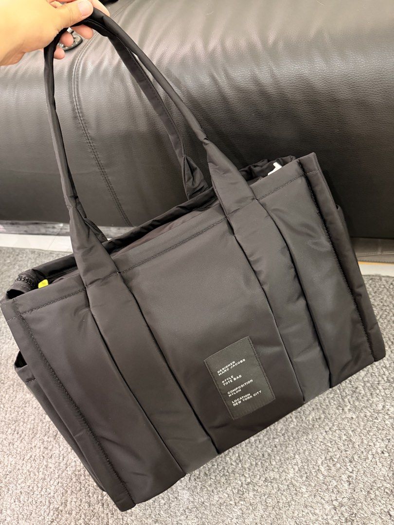 Marc Jacobs The Puffy Nylon Tote Bag Large (Category: Luxury Bags & Wallets) located in Manila. Submitted by luxora.ph (Listing ID 1449420198, Image 2). Description: Guaranteed authentic! Also available in medium and cement color.