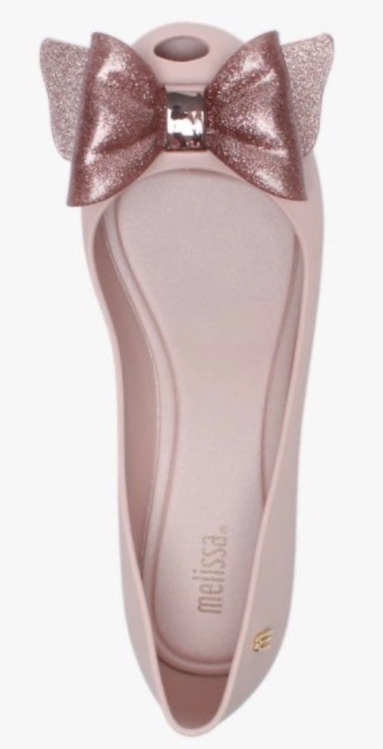 Melissa Pink Jelly Flats with Glitter Bow (Category: Flats & Sandals) located in Bulacan. Submitted by michie_chang (Listing ID 1449410329, Image 3). Description: - Brand: Melissa - Type: Jelly Flats - Color: Pink - Feature: Glitter bow on the front - Comfort: Super comfy - Versatility: Great for everyday wear or special occasions - Packaging: Comes in original box.