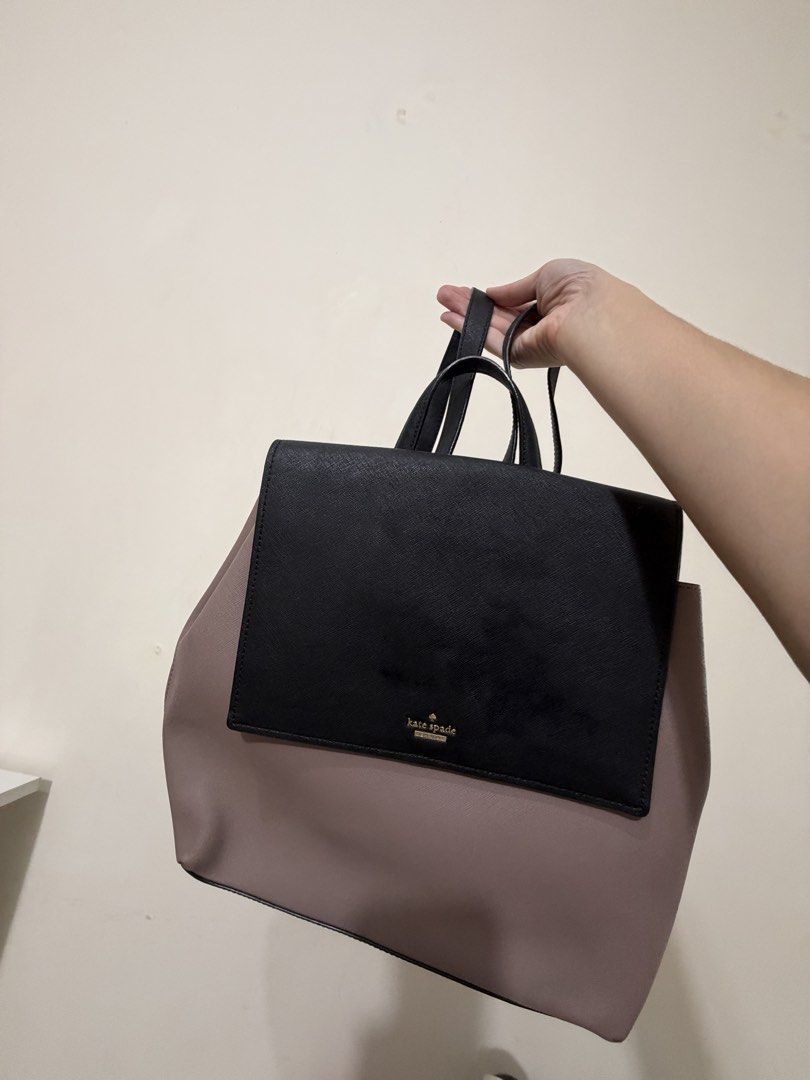 Michael Kors and Kate Spade bags (Category: Luxury Bags & Wallets) located in Manila. Submitted by declutteringbeee (Listing ID 1449480764, Image 3). Description: - Classic black Michael Kors tote bag - Genuine saffiano leather - Elegant gold hardware details - Ample interior space for essentials - Features top handles - Includes a detachable shoulder strap for versatile carrying - Ideal for work, school, or everyday errands - Interior is clean a