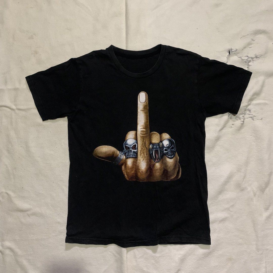 Middle Finger Skull Rings Graphic Print (Category: Tshirts & Polo Shirts ) located in Bulacan. Submitted by solsic (Listing ID 1449506909, Image 1). Description: No tags Pristine Print - Black t-shirt with striking graphic print on front and back. - Features a hand giving the middle finger, detailed with skull and snake rings. W: 19” L: 25” Small to Medium Well used, perfect for casual attire Issue: Mine: 450 plus SF Courier: J&T/Lalamove. Paymen