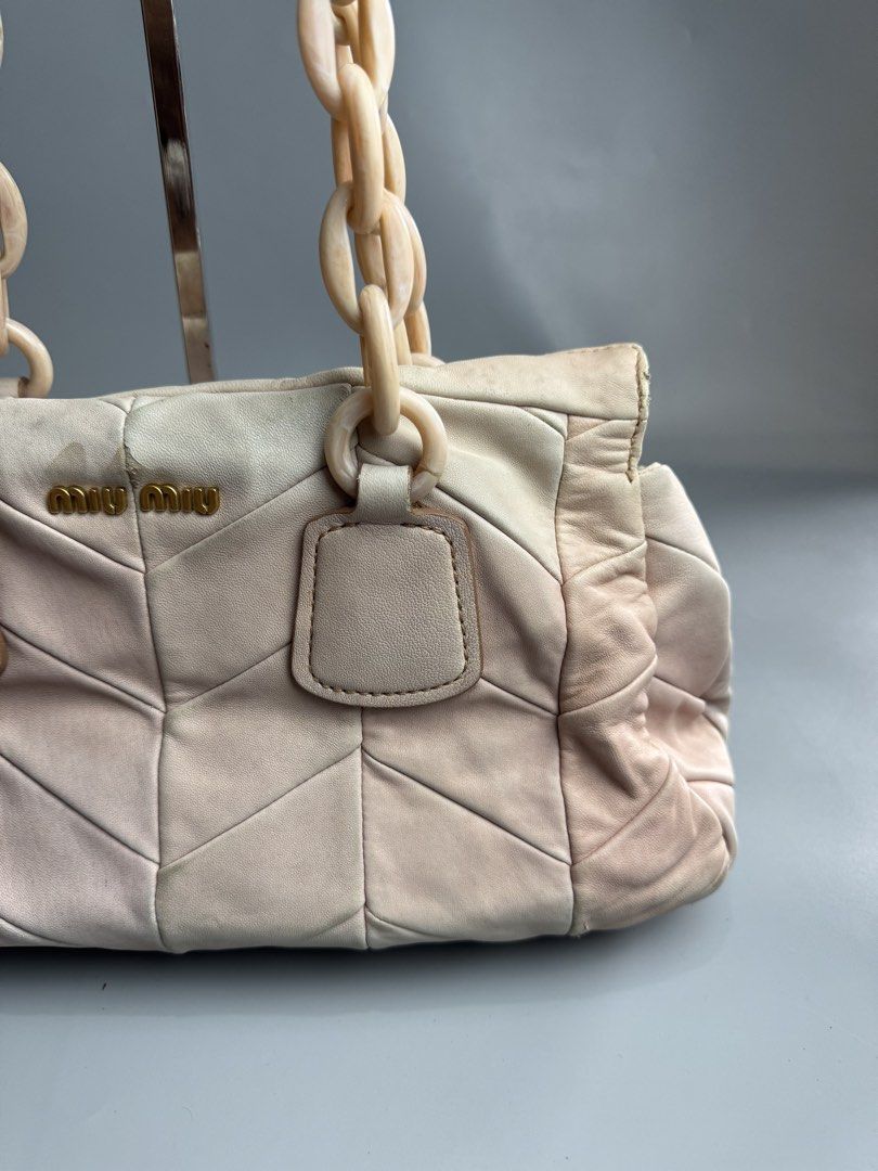 Miu Miu - Chain Bag in Light Pink (Category: Luxury Bags & Wallets) located in San Pablo. Submitted by hiddenrygn (Listing ID 1449482159, Image 2). Description: Miu Miu - Chain Bag in Light Pink Rank AB Signs of usage Color transfer/fadings Still in excellent condish Authentic DM!.