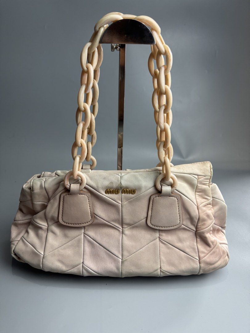 Miu Miu - Chain Bag in Light Pink (Category: Luxury Bags & Wallets) located in San Pablo. Submitted by hiddenrygn (Listing ID 1449482159, Image 1). Description: Miu Miu - Chain Bag in Light Pink Rank AB Signs of usage Color transfer/fadings Still in excellent condish Authentic DM!.