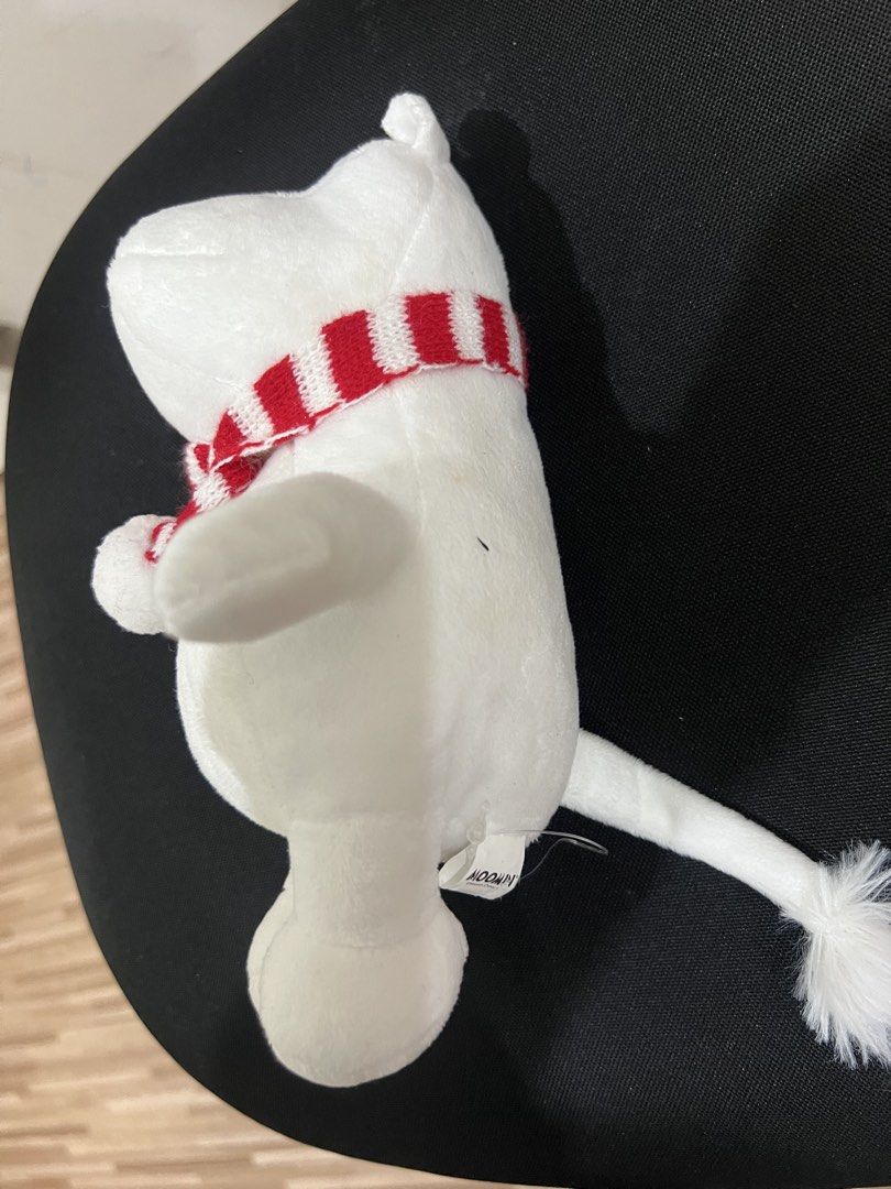 Moomin Plush Toy with Scarf (Category: Plushies & Soft Toys) located in Muntinlupa City. Submitted by goldinmygarage (Listing ID 1449486906, Image 2). Description: - Adorable Moomin plush toy - Features a cute red and white striped scarf - Super soft and cuddly material - Officially licensed Moomin Characters product - Approximately 20cm in height - Ideal gift for any Moomin enthusiast.
