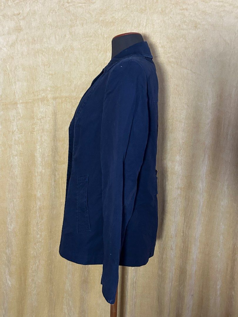 M&S Navy Blue Double Breasted Jacket (Category: Coats, Jackets and Outerwear) located in Batangas. Submitted by mkjgb (Listing ID 1449408332, Image 2). Description: Length from shoulder is 26”. Width at waist is 20” (laid flat). - Classic navy blue jacket - Double-breasted style with button closure - Two front pockets - Made from a sturdy cotton blend - Ideal for layering over shirts or dresses - A versatile addition to any wardrobe ❄️ Travel-Rea