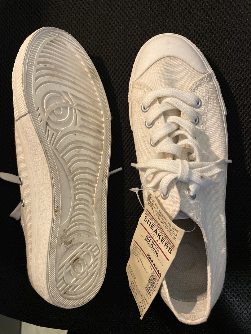 MUJI White Canvas Sneakers 23.0cm (Category: Sneakers) located in Makati City. Submitted by bonita76 (Listing ID 1449415157, Image 2). Description: - MUJI White Canvas Sneakers - Size: 23.0cm - Style: Classic low-top with lace-up closure - Condition: Soles & side show minor dirt from storage - Perfect for everyday, versatile wear.