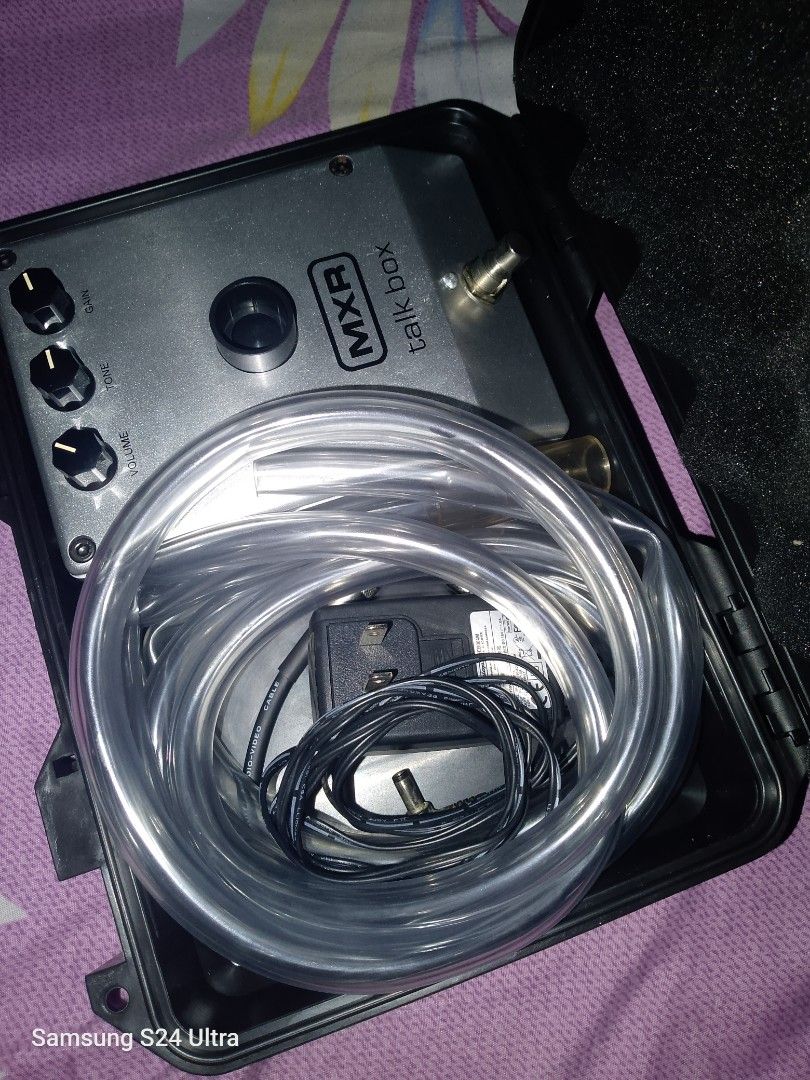 MXR Talk Box Guitar/Synthesizer Effects Pedal (Category: Music Accessories) located in Cabugao. Submitted by jayveekeys43 (Listing ID 1449502258, Image 1). Description: - MXR Talk Box for sale - Includes pedal, tubing, and power adapter - Ready to use, everything you need to get started - Achieve classic talk box guitar sounds - Comes with a protective case.