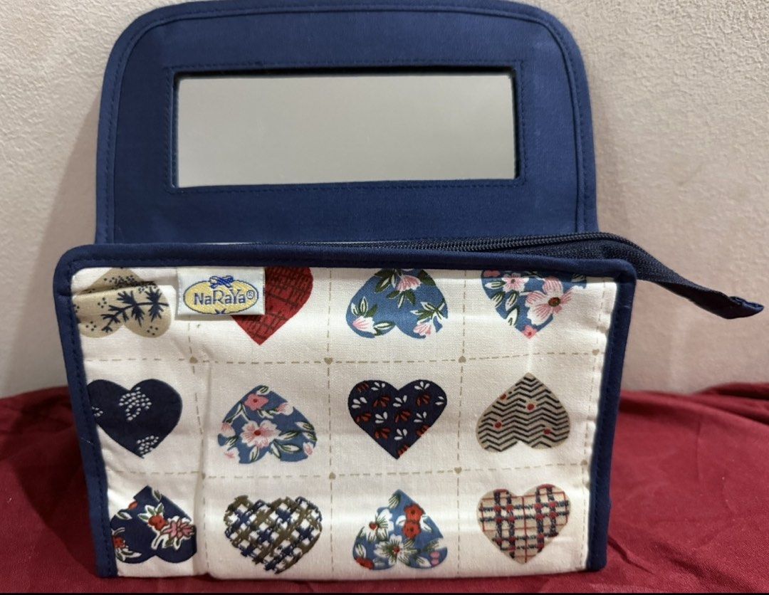 NaRaYa Pouch (Category: Purses & Pouches) located in Manila. Submitted by pickstuff (Listing ID 1449440440, Image 3). Description: - Cute NaRaYa cosmetic pouch - Adorable heart pattern all over - Features a built-in mirror inside - Secure zipper closure - Perfect for organizing makeup or toiletries - Great for travel or everyday use.