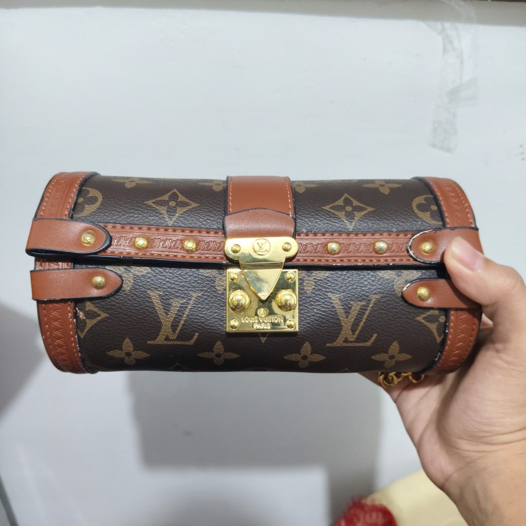 Negotiable Louis Vuitton Monogram Barrel Bag with Chain (Category: Luxury Bags & Wallets) located in Santiago. Submitted by juleah_c (Listing ID 1449459257, Image 2). Description: - Authentic Louis Vuitton Barrel Bag - Classic Monogram Canvas - Rich Brown Leather Trim - Elegant Gold-Tone Hardware - Detachable Gold Chain Strap Included - Secure Clasp Closure - Compact Size: Approximately 7 inches long - Versatile accessory for day or night.