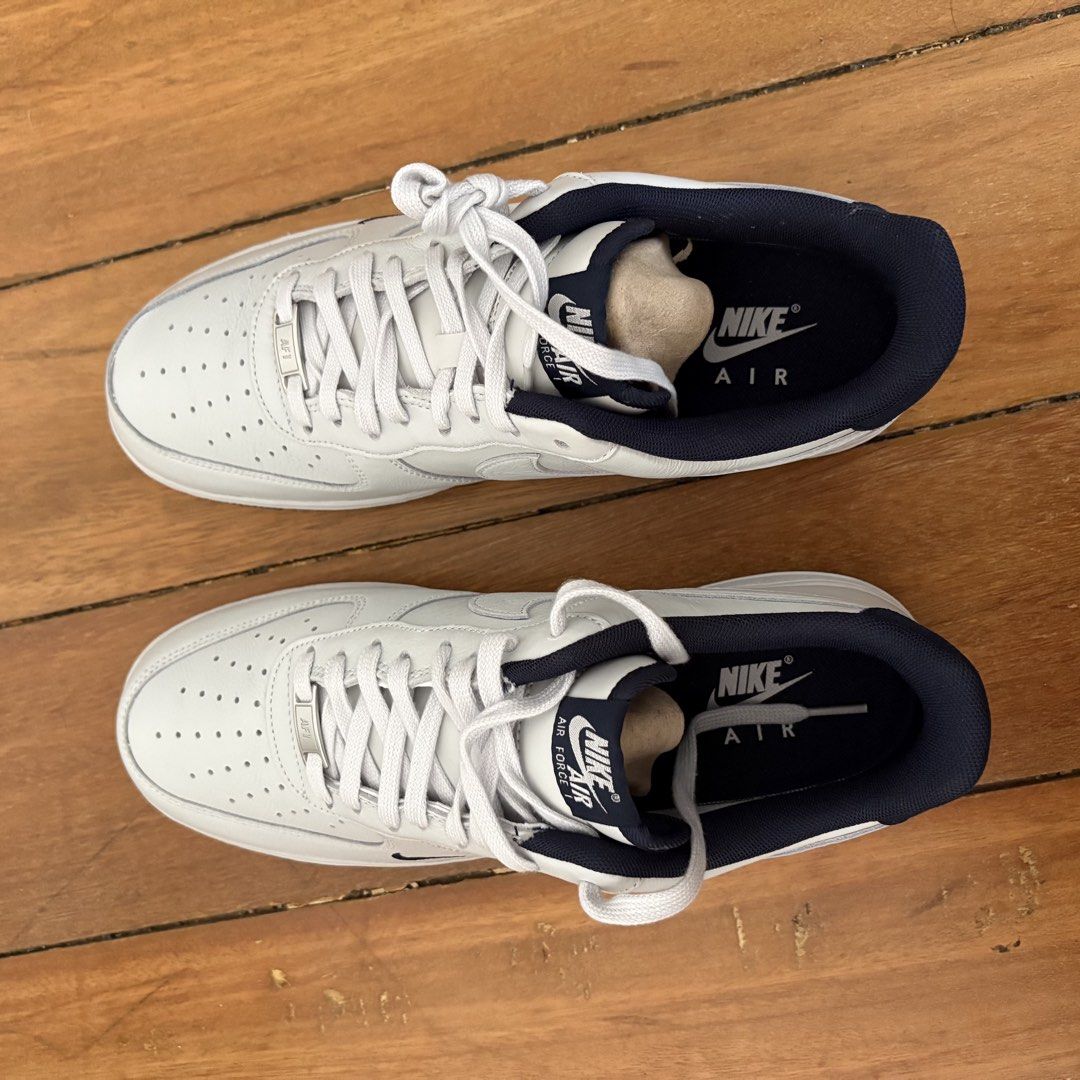 BRAND NEW NIKE Air Force 1 '07 LV8 Photon Dust (White and Navy Blue) (Category: Sneakers) located in Quezon City. Submitted by _crackle_ (Listing ID 1449377242, Image 2). Description: - Authentic, brand new, never been used before - Comes with original box, wrapping paper, and shoe inserts - Size: UK10/EUR45 - Rfs: impulsive purchase 😅.