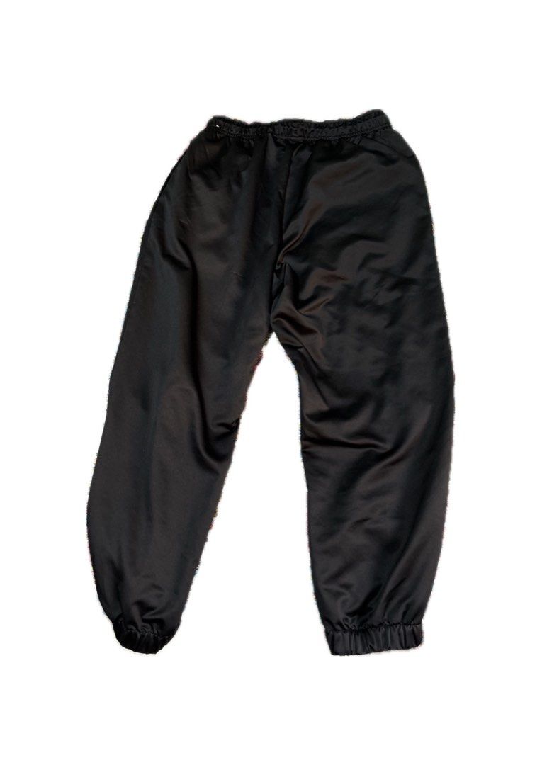 Nike Air Track Pants Black Joggers (Category: Joggers) located in Davao. Submitted by lilqtvert (Listing ID 1449416970, Image 2). Description: Black Nike Air track pants Elastic waistband with drawstring Ideal for casual wear or sports Price is nego.