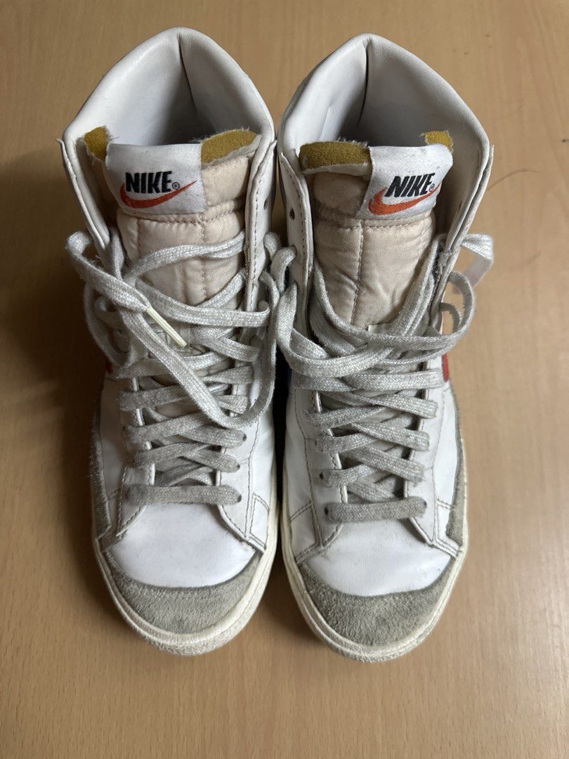 Nike Blazer Mid '77 Vintage White Blue Red (Category: Casual Shoes) located in Pasig City. Submitted by gabinet (Listing ID 1449504004, Image 2). Description: - Classic Nike Blazer Mid '77 Vintage - White leather with blue and red accents - High-top design - Perfect for everyday wear - Shows some signs of use, plenty of life left - Please check photos for detailed condition.