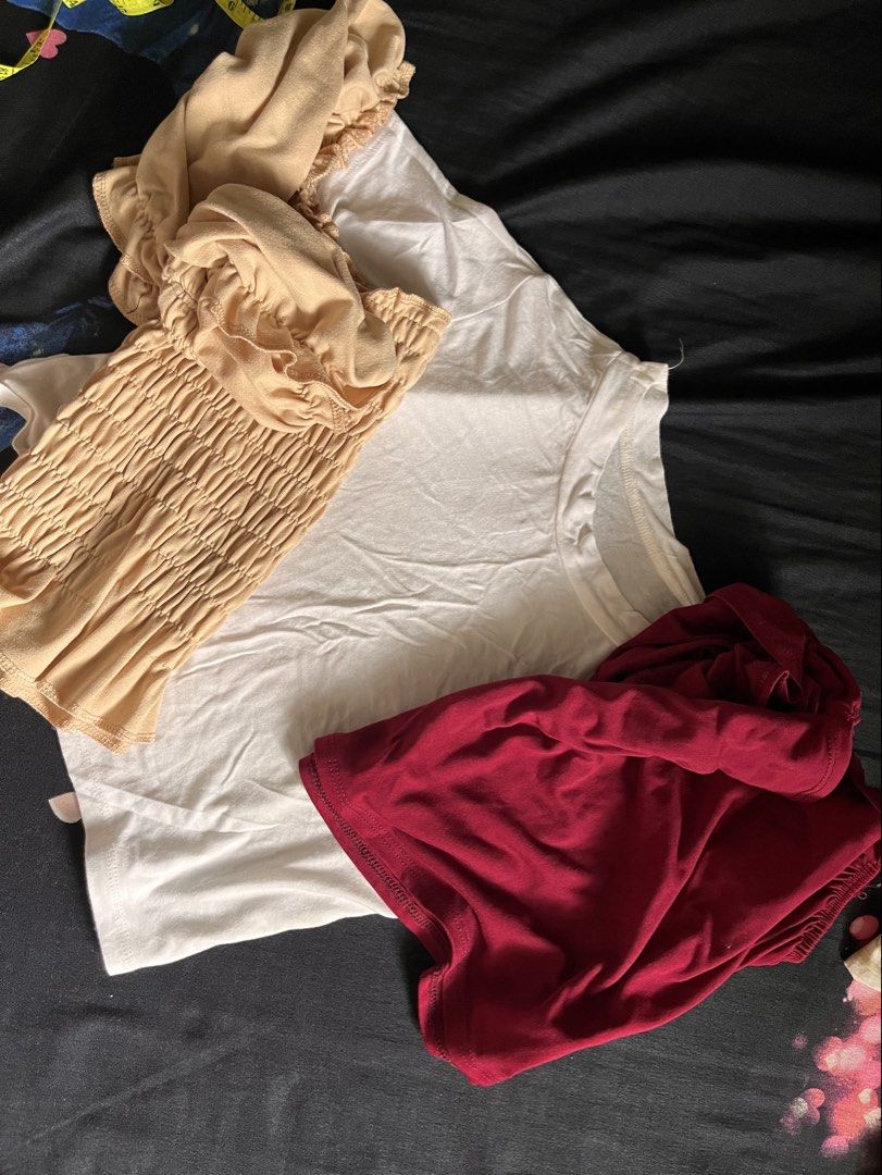Off-Shoulder Smocked Crop Tops Bundle (Category: Others Tops) located in Valenzuela. Submitted by moorub21 (Listing ID 1449405499, Image 3). Description: - Bundle of 2 stylish crop tops - Maroon off-shoulder top with tie details (no issue) - Beige smocked off-shoulder top (Issue loose garter on chest part) - Versatile for casual outings or dressing up - Buy these with free white top - Bundle for 100 pesos.