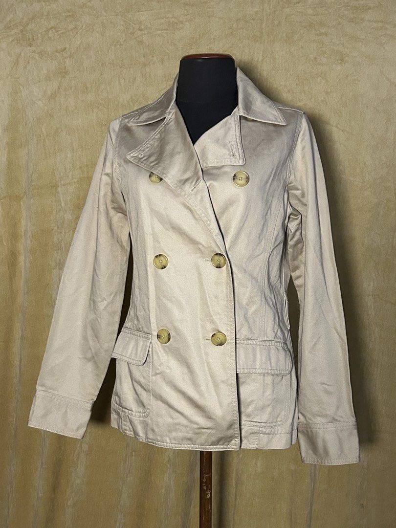 Old Navy Beige Double-Breasted Jacket (Category: Coats, Jackets and Outerwear) located in Batangas. Submitted by mkjgb (Listing ID 1449414811, Image 1). Description: Missing belt. Length from shoulder is 26”. Width at waist is 16.5” (laid flat). - Classic beige jacket - Double-breasted style with button closure - Two front pockets - Ideal for layering - Versatile and easy to pair with any outfit ❄️ Travel-Ready Winter Wear | Stylish • Cozy • Budg
