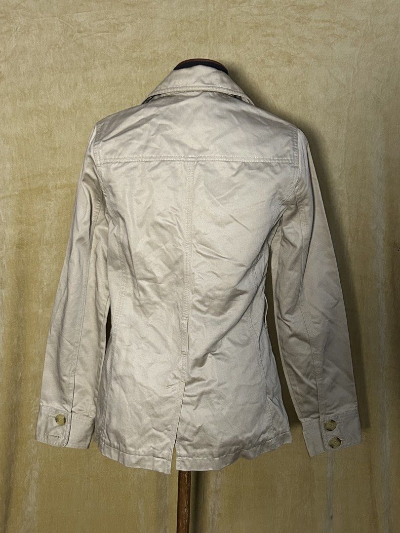 Old Navy Beige Double-Breasted Jacket (Category: Coats, Jackets and Outerwear) located in Batangas. Submitted by mkjgb (Listing ID 1449414811, Image 3). Description: Missing belt. Length from shoulder is 26”. Width at waist is 16.5” (laid flat). - Classic beige jacket - Double-breasted style with button closure - Two front pockets - Ideal for layering - Versatile and easy to pair with any outfit ❄️ Travel-Ready Winter Wear | Stylish • Cozy • Budg