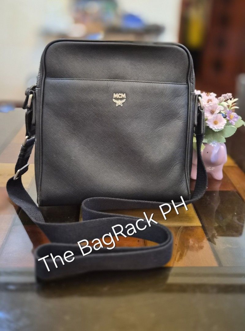 Original MCM Saffiano Leather Messenger Bag (Category: Luxury Bags & Wallets) located in Cabanatuan. Submitted by meyrasol (Listing ID 1449383076, Image 1). Description: corner rubs sa front open pipe sa corner sa likod 10 x 11 x 2 in.