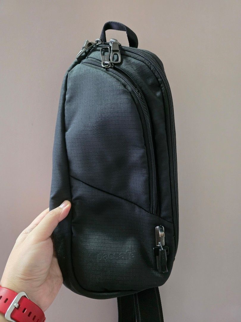 Pacsafe Vibe (Category: Belt bags, Clutches and Pouches) located in Manila. Submitted by tch_86 (Listing ID 1449365597, Image 1). Description: - Black color - Main zippered compartment - Front zippered pocket - RFID blocking technology for secure data protection - Slash-resistant materials for enhanced security - Adjustable strap for a comfortable fit - Perfect for travel and everyday use.