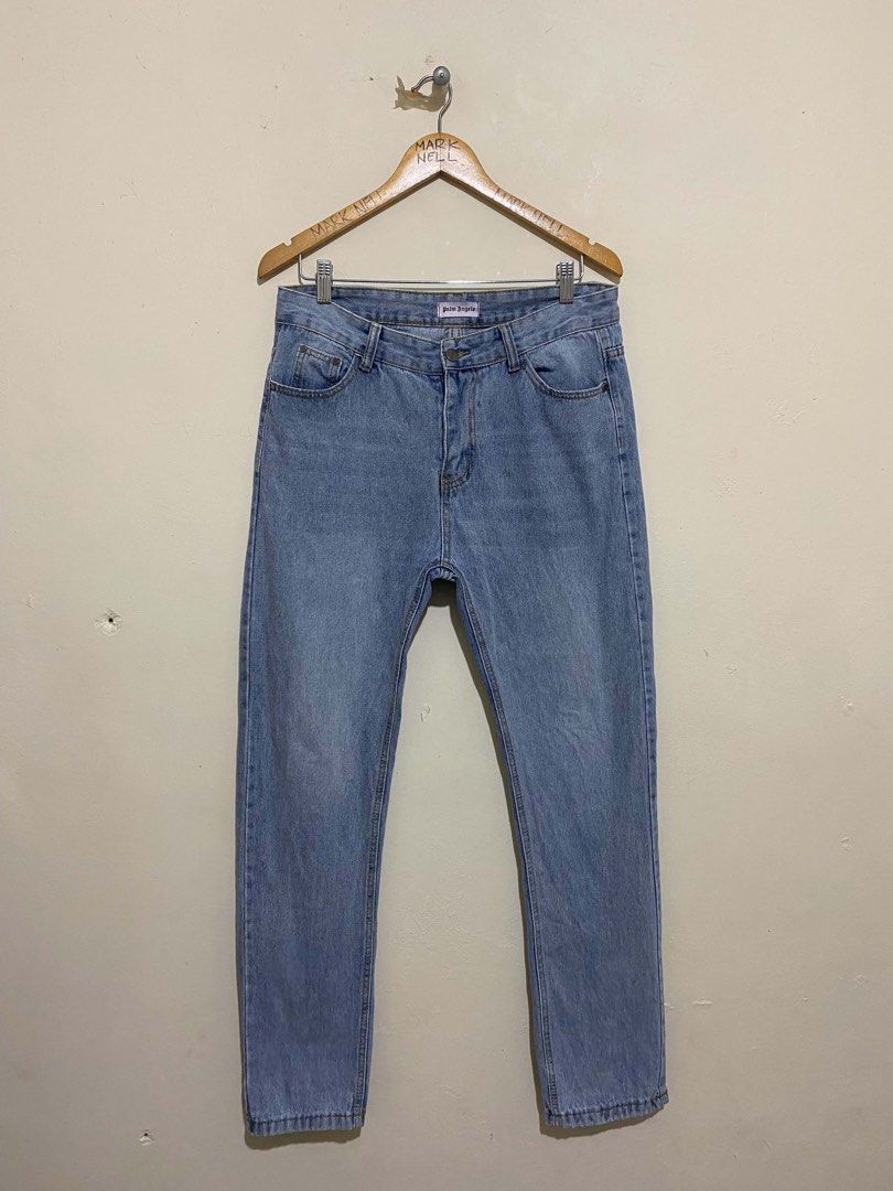 Palm Angels Light Wash Denim Jeans (Category: Jeans) located in Caloocan City. Submitted by mrknll (Listing ID 1449344311, Image 1). Description: - Brand: Palm Angels - Wash: Light wash denim - Fit: Straight leg - Details: Signature gothic logo on back, classic five-pocket styling - Closure: Button and zip fly - Occasion: Casual wear.