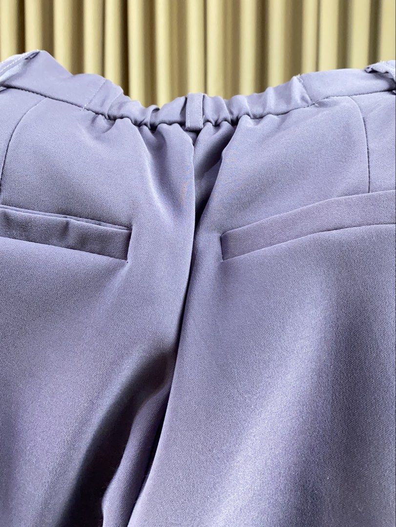 Pastel Purple Tailored Flare Pants (Category: Other Bottoms) located in Quezon City. Submitted by picksandkisses.2nd (Listing ID 1449367091, Image 2). Description: — For casual/semi-formal office wear — Very cutesy 💜💗 Measurement (laid flat) W: 26” L: 37”.