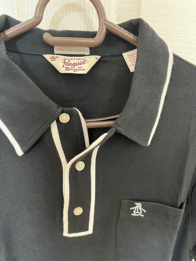 Penguin Polo Shirt (Category: Tshirts & Polo Shirts ) located in Manila. Submitted by vjr21 (Listing ID 1449419516, Image 2). Description: Penguin Polo Shirt Color: Black Size: Medium Condition: Lightly used Dimensions: 20 x 26.5 .