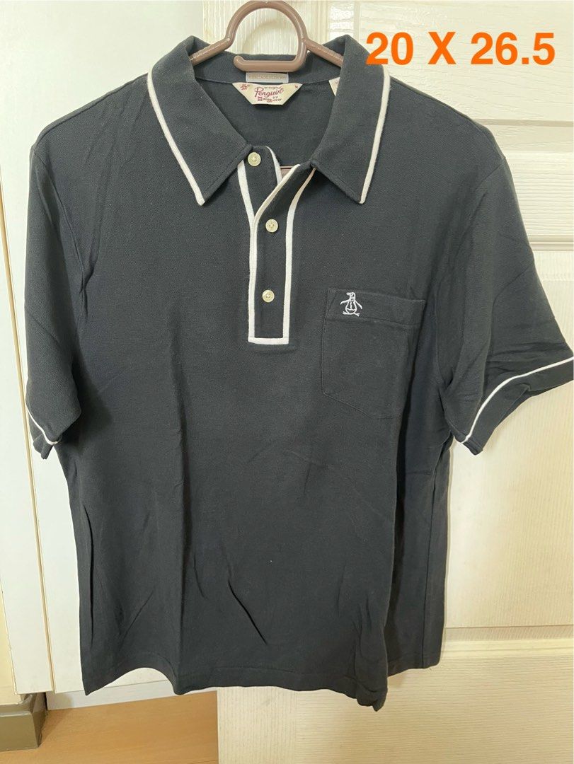 Penguin Polo Shirt (Category: Tshirts & Polo Shirts ) located in Manila. Submitted by vjr21 (Listing ID 1449419516, Image 1). Description: Penguin Polo Shirt Color: Black Size: Medium Condition: Lightly used Dimensions: 20 x 26.5 .
