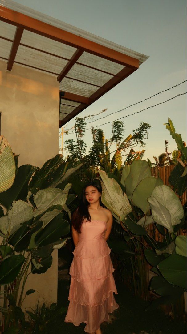 Pink Strapless Tiered Ruffle Maxi Dress (Category: Dresses) located in Dasmarinas. Submitted by hellojoena (Listing ID 1449444499, Image 1). Description: - Beautiful pink strapless maxi dress - Features a tiered ruffle design all the way down - Made with a lovely, flowy fabric - Ideal for events or special occasions - Looks very pretty when worn - Selling because it's no longer needed.