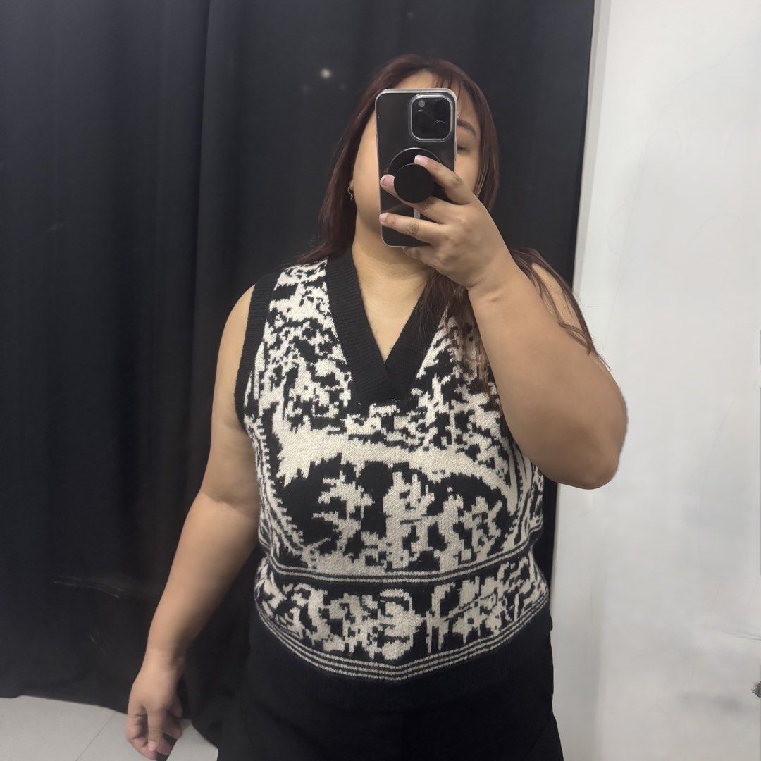 PLUS SIZE V Neck Knitted Sweater Vest Top (Category: Sleeveless) located in Taytay. Submitted by ruicervitillo (Listing ID 1449481793, Image 2). Description: ⭐️ Condition: 9/10 (Slightly used) ❄️ Selling it half the price - used once on my recent Vietnam trip. Unique and can be styled in many ways. ✅ My size is 42B 38W 5’3”H and fits me well. Recommending it to size 38B to 44B.
