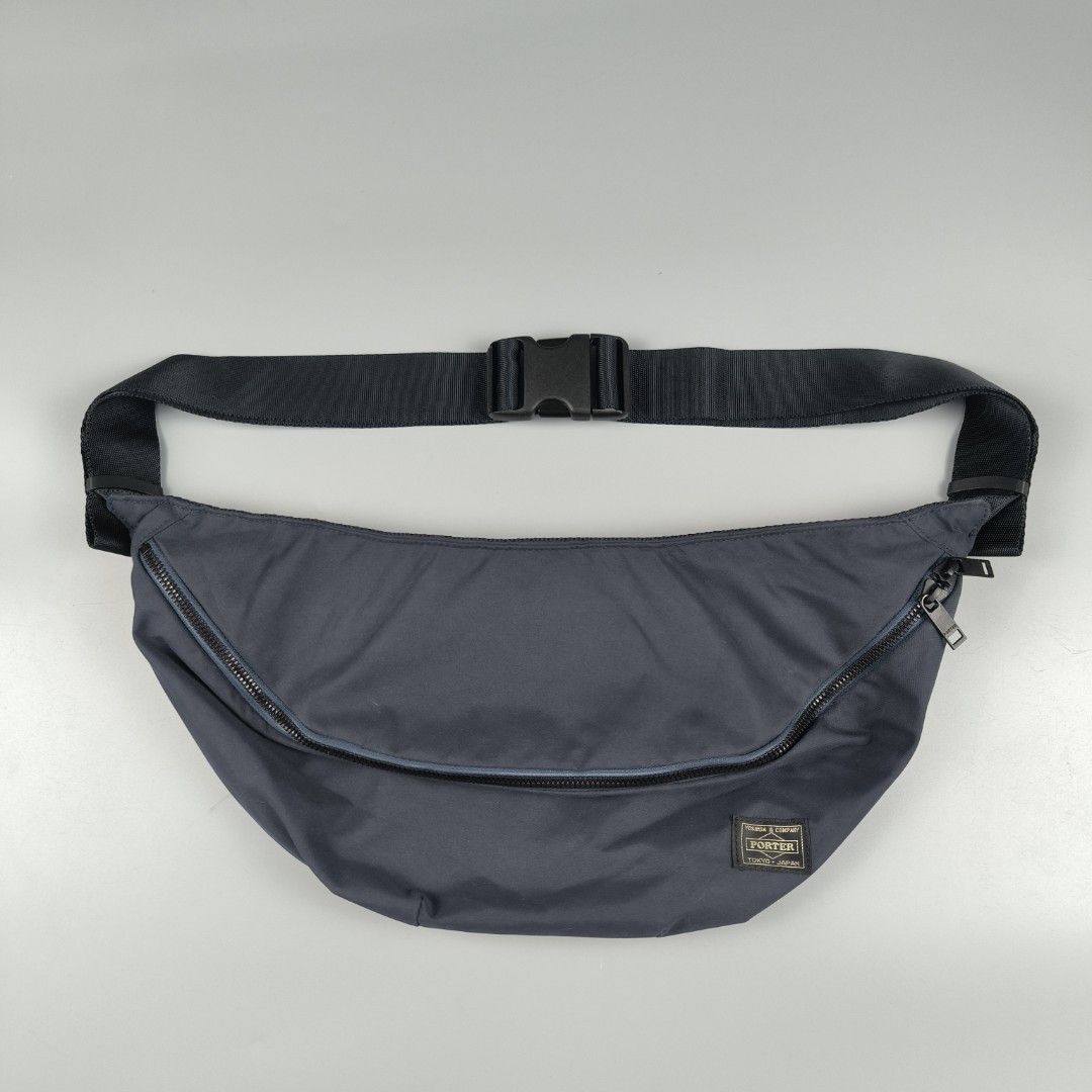 Porter Griege Waistpack (Large) Navy Blue (Category: Sling Bags) located in General Mariano Alvarez. Submitted by rammrtnz (Listing ID 1449436362, Image 1). Description: Porter Griege Waistpack (Large) Navy Blue Capacity: approximately 3-5L Dimension: Height - 7.5inches Width - 17.5inches Excellent condition Php2980+shipping fee Mode of payment: Via Gcash/Maya or RCBC/BPI Message us for more details and transaction. Thank you so much and stay saf