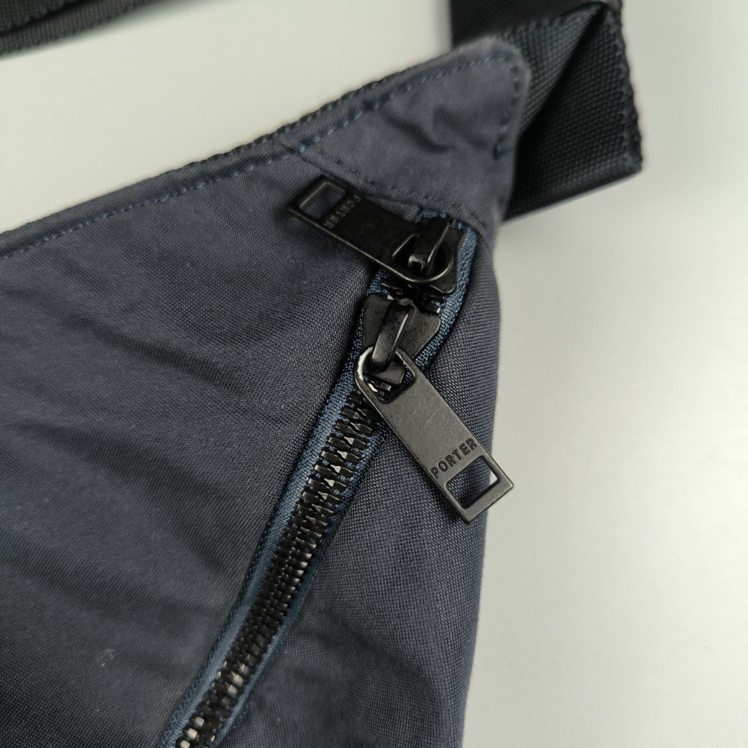 Porter Griege Waistpack (Large) Navy Blue (Category: Sling Bags) located in General Mariano Alvarez. Submitted by rammrtnz (Listing ID 1449436362, Image 3). Description: Porter Griege Waistpack (Large) Navy Blue Capacity: approximately 3-5L Dimension: Height - 7.5inches Width - 17.5inches Excellent condition Php2980+shipping fee Mode of payment: Via Gcash/Maya or RCBC/BPI Message us for more details and transaction. Thank you so much and stay saf