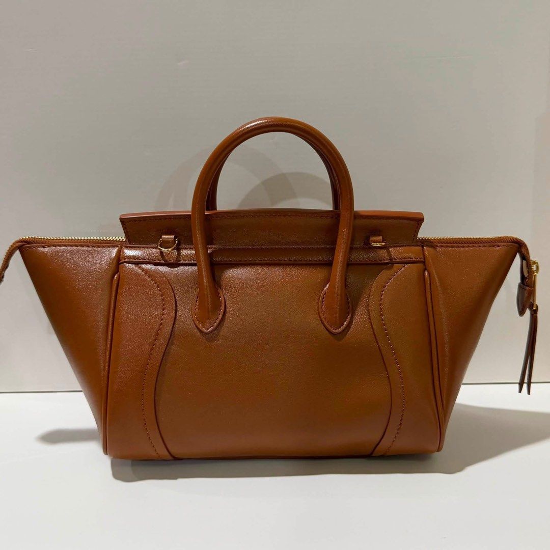 Preloved Celine Canvas Handbag (Category: Luxury Bags & Wallets) located in Manila. Submitted by bagsandshoesmanymore (Listing ID 1426391654, Image 3). Description: Celine Genuine Leather Actual picture posted Japan thrift source Size 38cm Rare to find Please read before you order 👉🏻❗️Payment first before shipping ❗️Cut off time of payment 11am sameday delivery ❗️NO MEET UP / NO PICK UP ❗️ORDER CANNOT BE CANCELLED ❗️PLEASE DON’T BUY IF YOU ARE 
