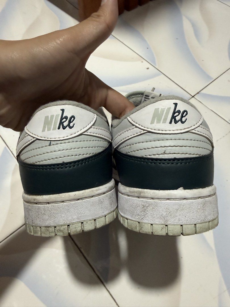 Preloved Nike Dunk Low Retro (Green / Mint green) (Category: Sneakers) located in Dasmarinas. Submitted by jammrcd (Listing ID 1449476058, Image 2). Description: Selling my Preloved Nike Dunk Low Retro (Green / Mint green) Size: 27.5cm RFS: Decluttering Lalamove should be shouldered by buyer. Pwede rin pong meet up around Dasma, Cavite - basta sagot po ni buyer yung pamasahe ko. Hehe. .