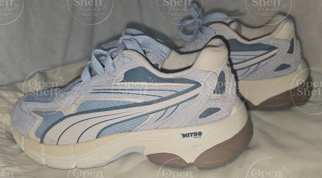 Puma Teveris Nitro Pastel Sneakers (Category: Sneakers) located in Baguio. Submitted by openshelf_findsph (Listing ID 1449473971, Image 2). Description: ‼️PLEASE READ 😊 Brand: PUMA (💯 Original) Condition: Slightly used with minimal, barely noticeable flaw. No damages. ✨️ Size: 40.5 EUR / 8 US / 26 cm ✨️ Color: Silver Sky / Puma White / Icy Blue / Warm White ✨️ Stylish Y2K-inspired sneakers influenced by early 2000s running aesthetics, combining