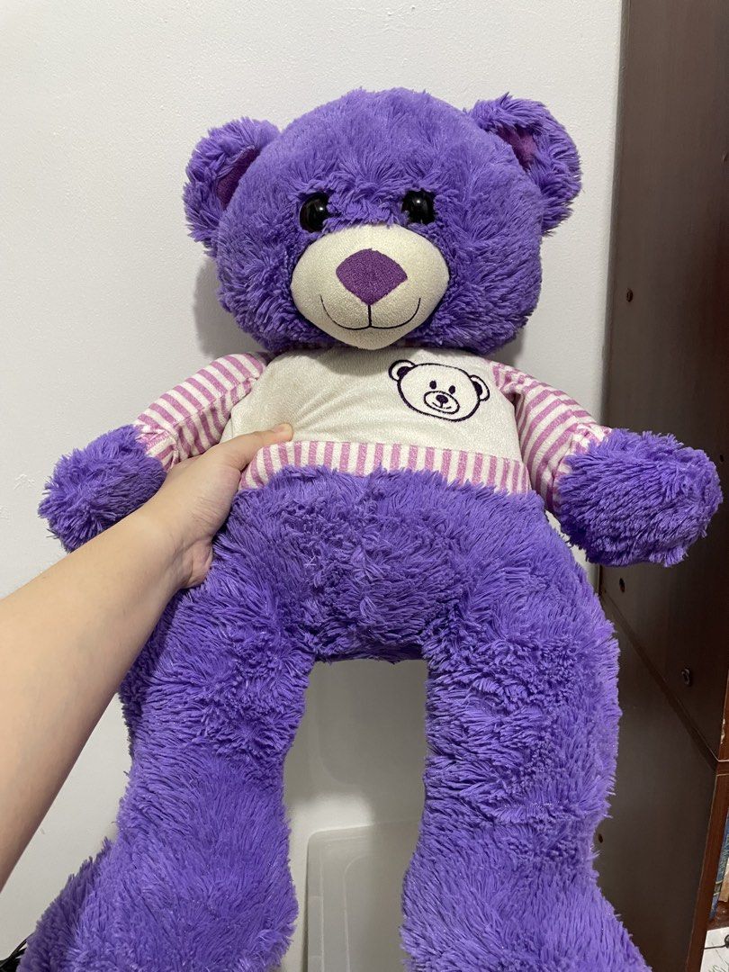 Purple Teddy Bear Toy (Category: Plushies & Soft Toys) located in Quezon City. Submitted by malfoy_declutter (Listing ID 1449411091, Image 3). Description: - soft purple teddy bear -24 inches size .
