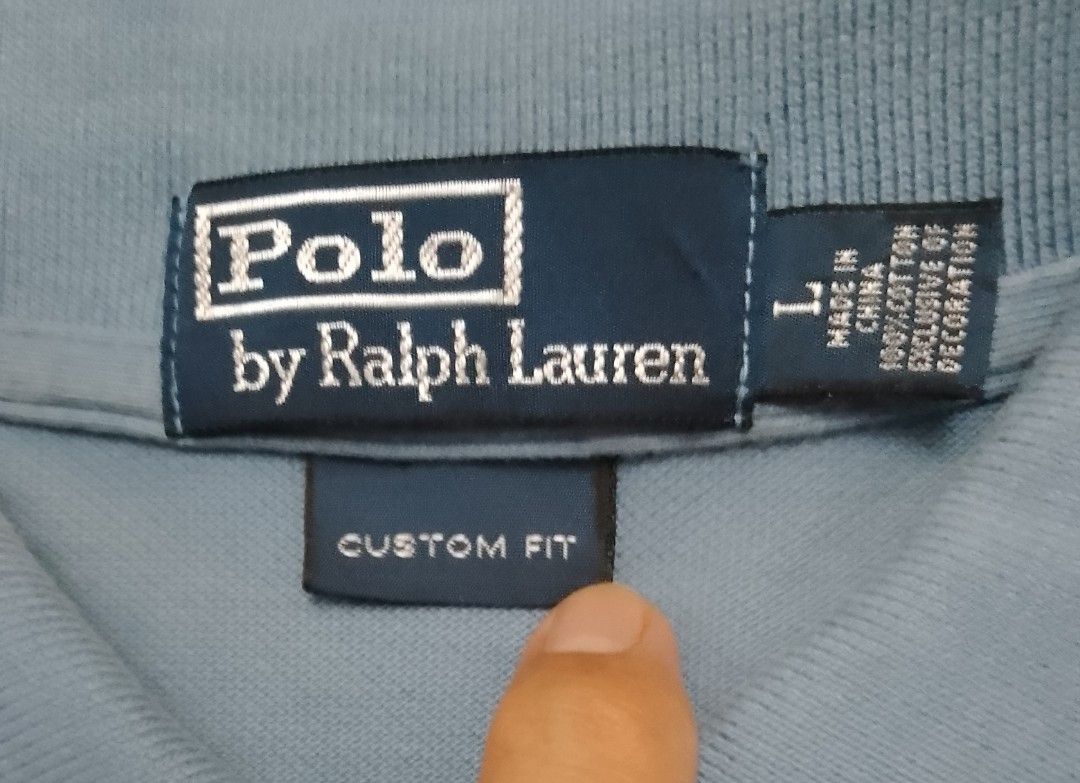 Ralph Lauren Polo Shirt (Category: Activewear) located in Antipolo. Submitted by d.tuazon (Listing ID 1443723304, Image 3). Description: This is a blue Polo Ralph Lauren polo shirt featuring an embroidered yellow pony logo.Custom Slim Fit Mesh Polo Shirt: Around ₱8,950 if brandnew in Rustans Dept.Store.Size 22 inches width and 29 inches length.Price 375 only.Rizal area.Shipping sagot ng buyer..