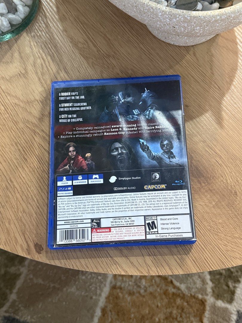 Resident Evil 2 Remake PS4 Game (Category: PlayStation) located in Manila. Submitted by banana09_ (Listing ID 1449399813, Image 2). Description: - Resident Evil 2 Remake for PlayStation 4 - Experience the classic survival horror reimagined - Play as Leon S. Kennedy or Claire Redfield - Survive the zombie outbreak in Raccoon City - Features intense action and terrifying scares - Rated M for Mature.