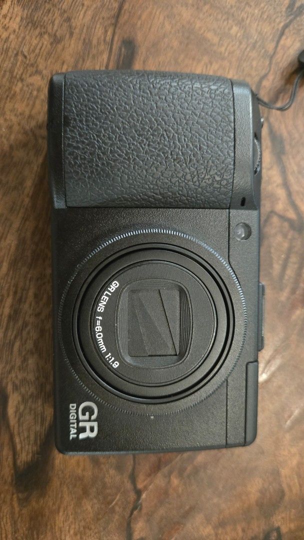Ricoh GR Digital III Digital Camera (Category: Cameras) located in Manila. Submitted by prelovedbybia (Listing ID 1449459669, Image 3). Description: - Ricoh GR Digital III compact digital camera - Ideal for on-the-go photography - Features GR Lens f=6.0mm 1:1.9 - Textured front grip for comfortable handling - Easy-to-use back controls - Comes with a strap - Ready for its next owner.
