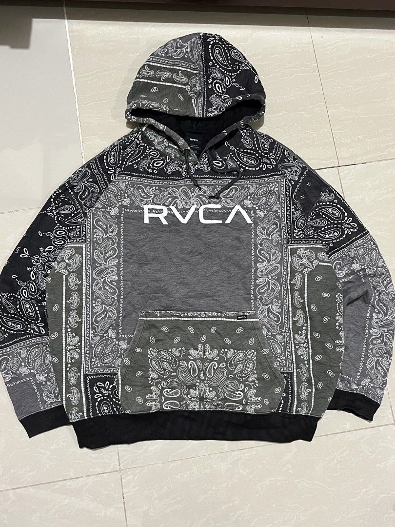 RVCA Bandana Patchwork Hoodie (Category: Coats, Jackets and Outerwear) located in Manila. Submitted by jorgemabelin2001 (Listing ID 1449364029, Image 1). Description: - Stylish RVCA hoodie with a unique bandana patchwork design. - Prominent RVCA logo on the front. - Features the 'Balance of Opposites' graphic on the back. - Includes a convenient front pocket. - Adjustable drawstrings for the hood. - Ideal for casual and everyday wear..