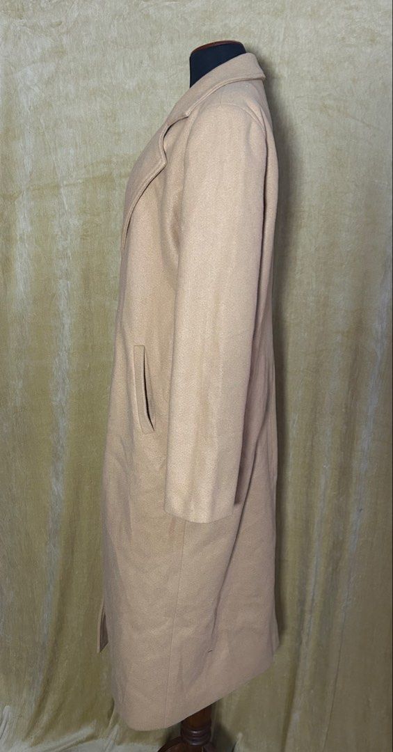 Shein Camel Longline Wool Blend Coat (Category: Coats, Jackets and Outerwear) located in Batangas. Submitted by mkjgb (Listing ID 1449532028, Image 2). Description: Length from shoulder is 45”. Width at waist is 21” (laid flat). - Classic camel longline coat - Single button closure - Two front pockets - Ideal for layering over any outfit - Versatile wardrobe staple - Perfect for cooler weather ❄️ Travel-Ready Winter Wear | Stylish • Cozy • Budget