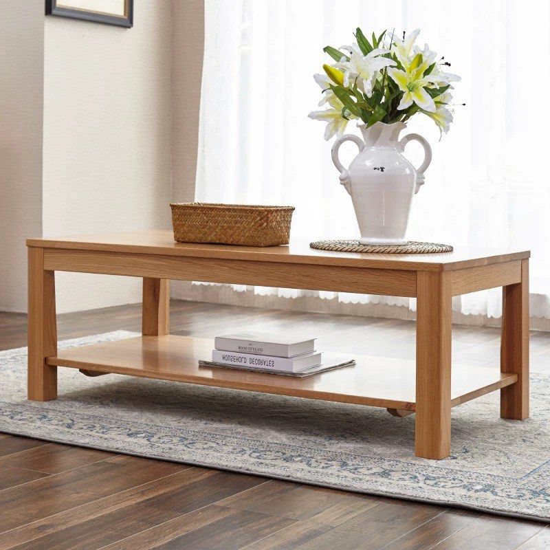 Solid Wood Table (Category: Tables & Sets) located in Singapore. Submitted by alex9401 (Listing ID 1449425222, Image 1). Description: - Solid wood coffee table - Natural oak color, solid US white oak - Features a lower shelf for extra storage - Dimensions: 1100mm (L) x 500mm (W) x 430mm (H) - Perfect for living rooms.