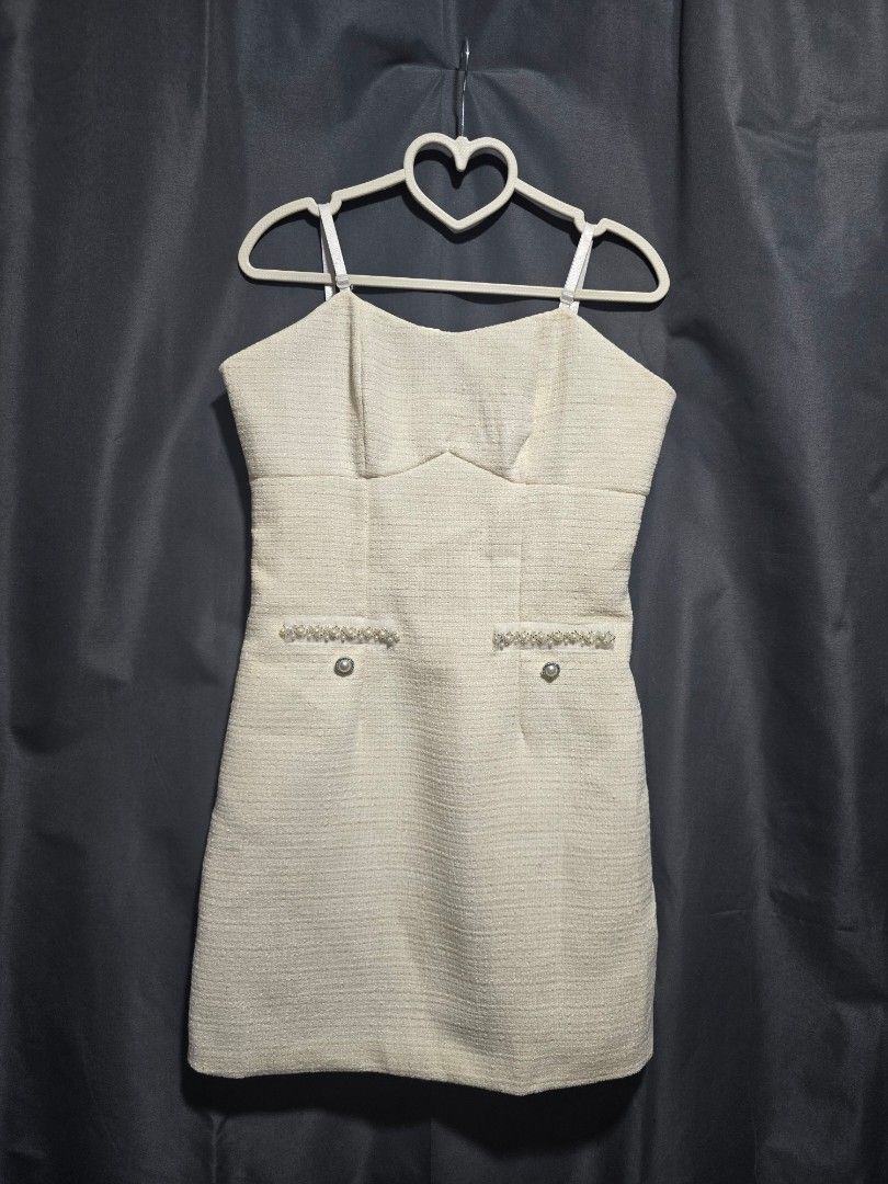 Strappy White Tweed Dress (Category: Dresses) located in Mabalacat. Submitted by cheriepicked (Listing ID 1449394695, Image 1). Description: Cream textured dress with beaded pockets. Sleeveless style with adjustable straps, perfect for parties or casual wear. This is not padded. Measurements Bust: Relaxed 30, stretches up to 34 Waist: 28 Shipping & Payment Details 📦 Shipping: Shipping fee to be shouldered by the buyer. 🚚 Method of Delivery (MOD