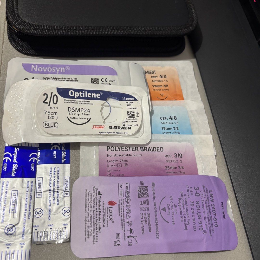 [Plus extra sutures] Surgical Suture Practice Kit with Instruments and Sutures (Category: Medical Supplies & Tools) located in Manila. Submitted by sanrioproject (Listing ID 1449371929, Image 2). Description: Actual hospital sutures included. You can ask for extra if needed ☺️ Reason for selling: I know how to suture now :) - Complete suture practice kit for training and skill development. - Includes a practice pad with various incision types. - 