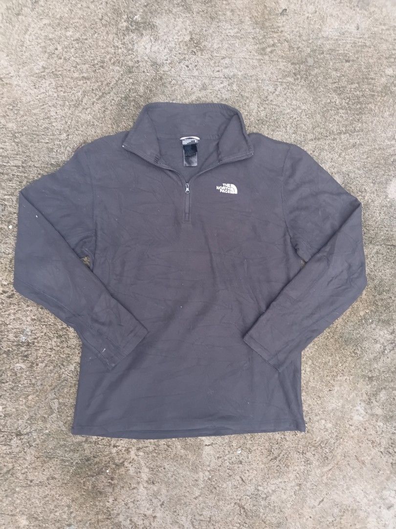 The North Face Fleece Pullover 1/4 Zip Men's Size M (Category: Coats, Jackets and Outerwear) located in Manila. Submitted by rollitgarments (Listing ID 1449428575, Image 1). Description: - The North Face Fleece Pullover - Men's Size M - Dark Grey Color - Quarter Zip Design - Made in Vietnam - Ideal for layering or casual wear - Please check photos for detailed condition.
