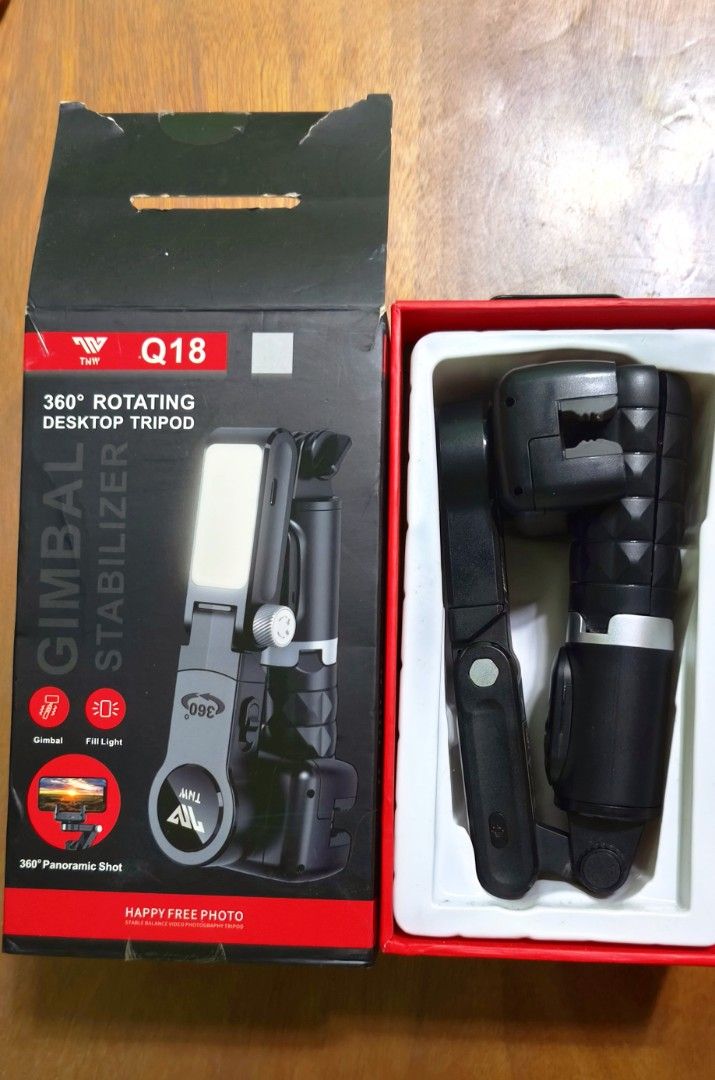 TNW Q18 Gimbal Stabilizer & 360° Rotating Desktop Tripod (Category: Gimbals & Stabilizers ) located in Manila. Submitted by newforest_89e460 (Listing ID 1449407229, Image 1). Description: Looking to upgrade your content creation, vlogs, or TikTok videos? This TNW Q18 Gimbal Stabilizer is a compact, all-in-one tool perfect for smooth shots, stable panning, and hands-free video recording. - Q18 Gimbal Stabilizer - 360 Rotating Desktop Tripod - Buil