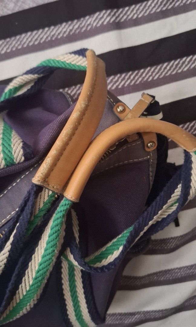 Tory Burch Tote Bag (Category: Luxury Bags & Wallets) located in Bacoor. Submitted by well_loved_stuffs (Listing ID 1449410718, Image 3). Description: - A bit faded na - purchase here - with issue sa handle and leather sa zipper.