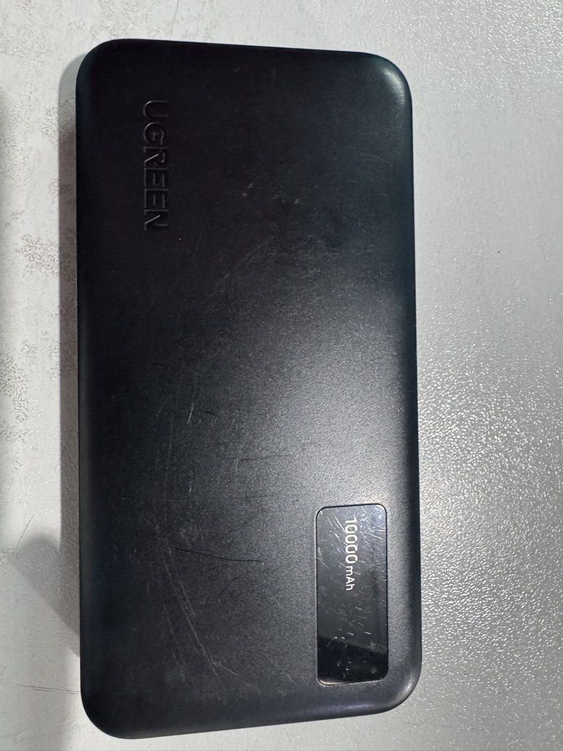 Ugreen powerbank (Category: Chargers) located in Manila. Submitted by mica_03 (Listing ID 1449423700, Image 3). Description: With charger No issues 10000MAH PM FOR DETAILS.
