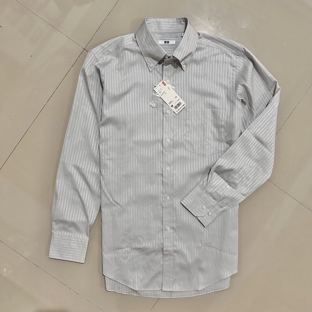 Uniqlo Button Down Longsleeve (Category: Formal Shirts) located in Irosin. Submitted by kylebri (Listing ID 1449454264, Image 1). Description: Uniqlo Button Down Longsleeve brand new with tag no issue size medium 20W x 29L direct message me ! 📥.